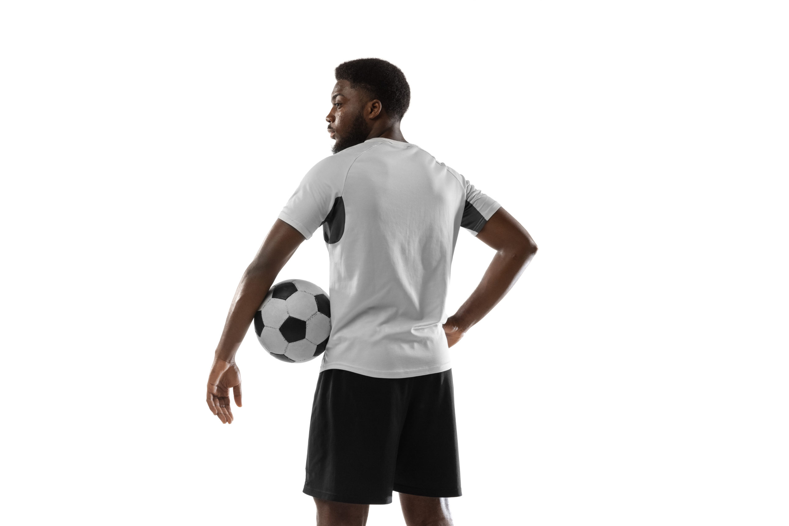 dynamic young african man male football soccer player training isolated scaled